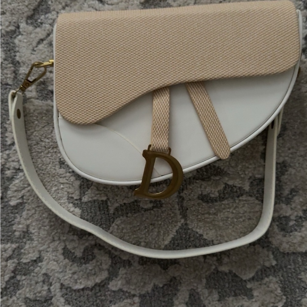 saddle bag with D logo